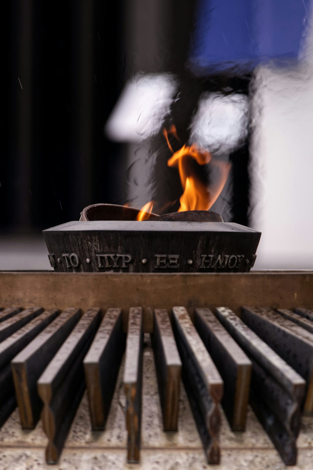 a close up of a piano with a flame