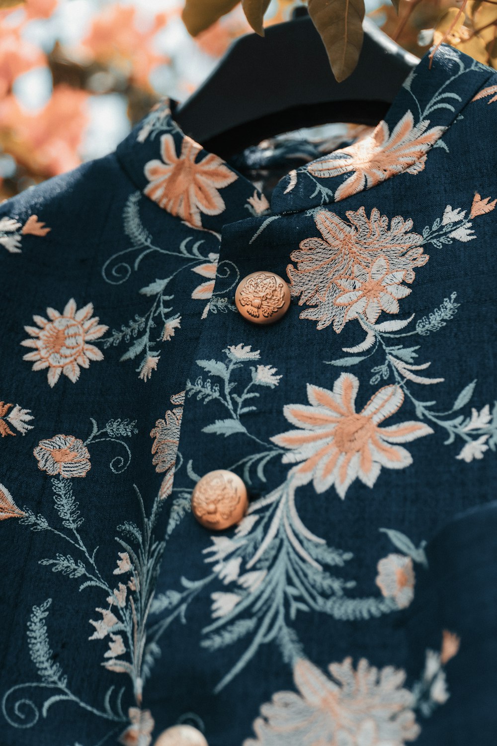 black white and orange floral button up shirt