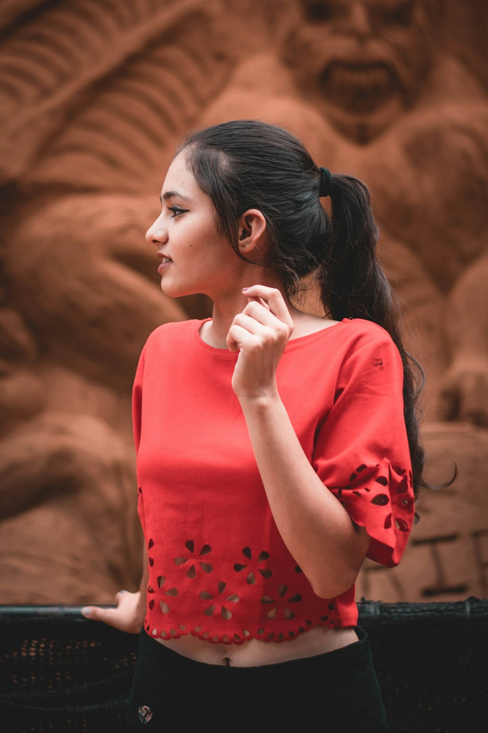 woman in red crew neck shirt