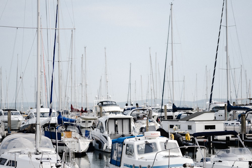 a boat is docked next to a body of water