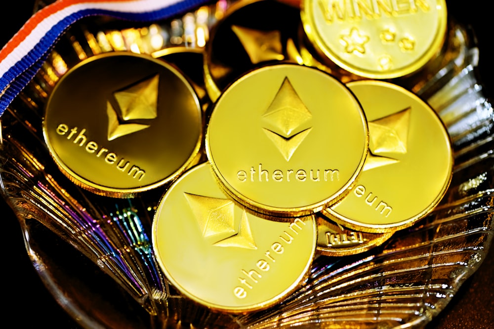 a close up of a plate of gold medals