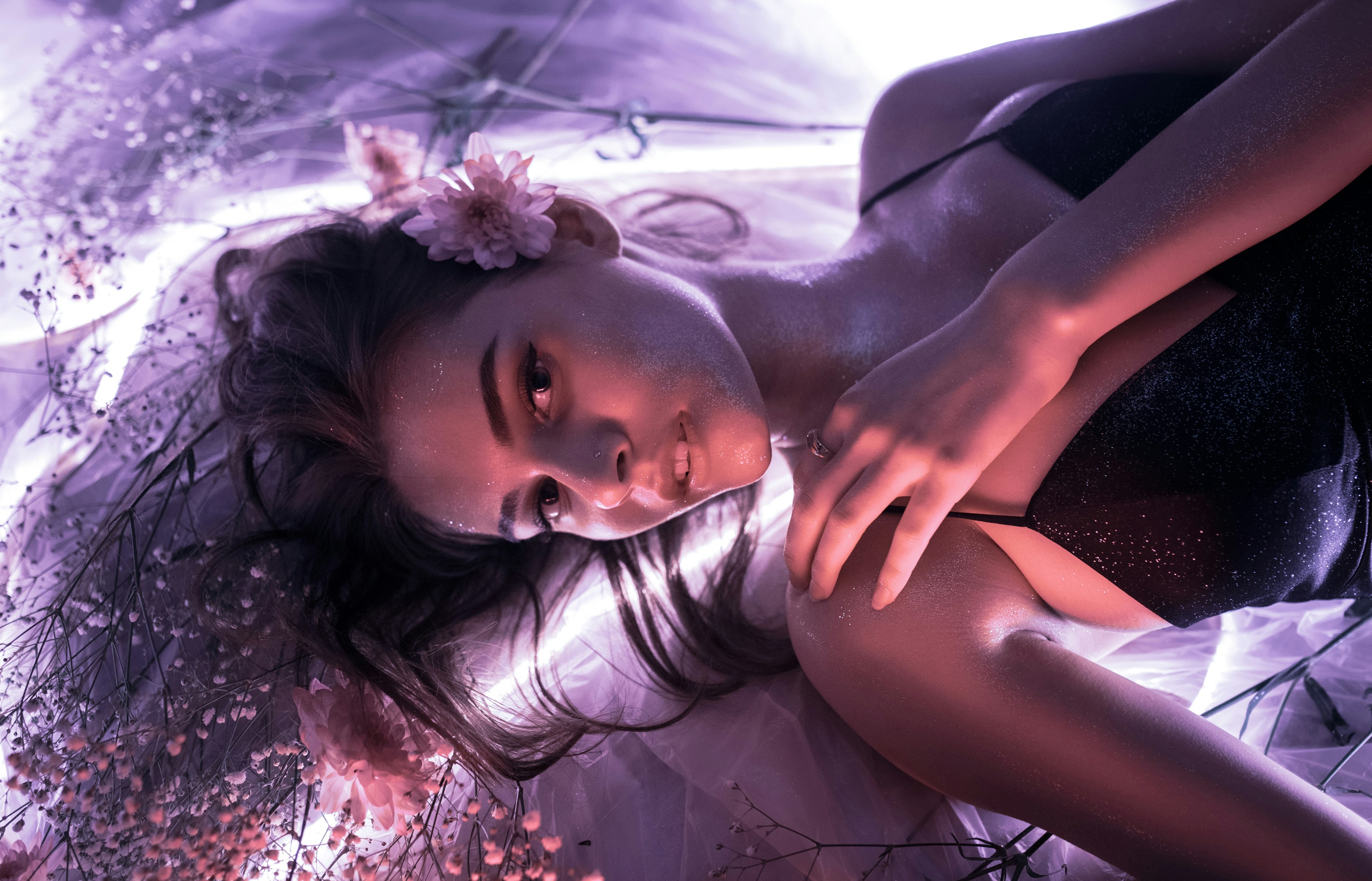 a woman in a white dress posing for a picture