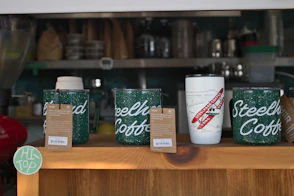 a display of coffee cups on a table