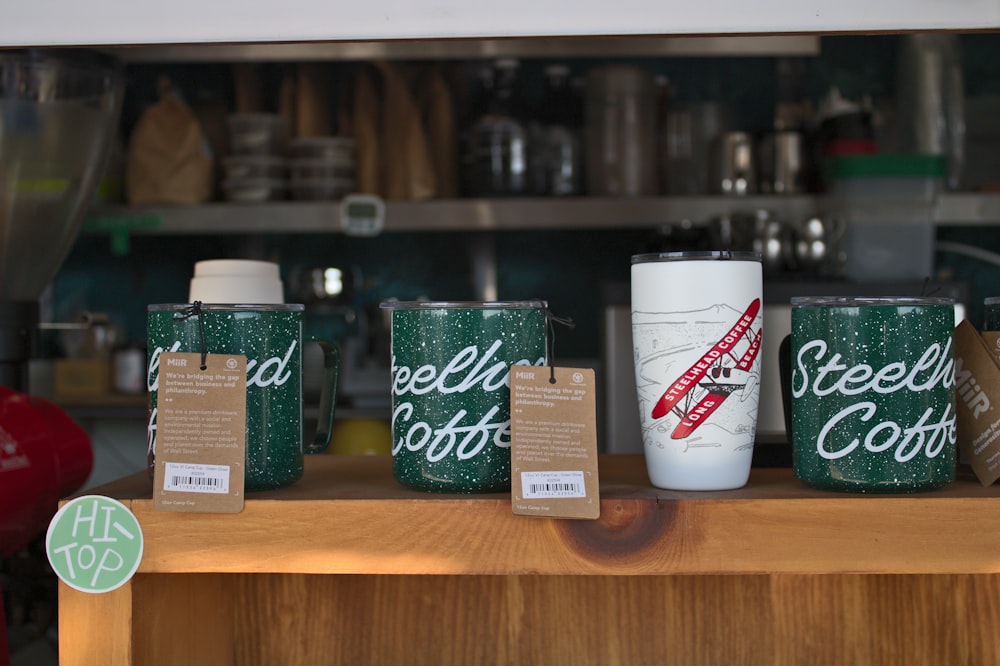 a display of coffee cups on a table