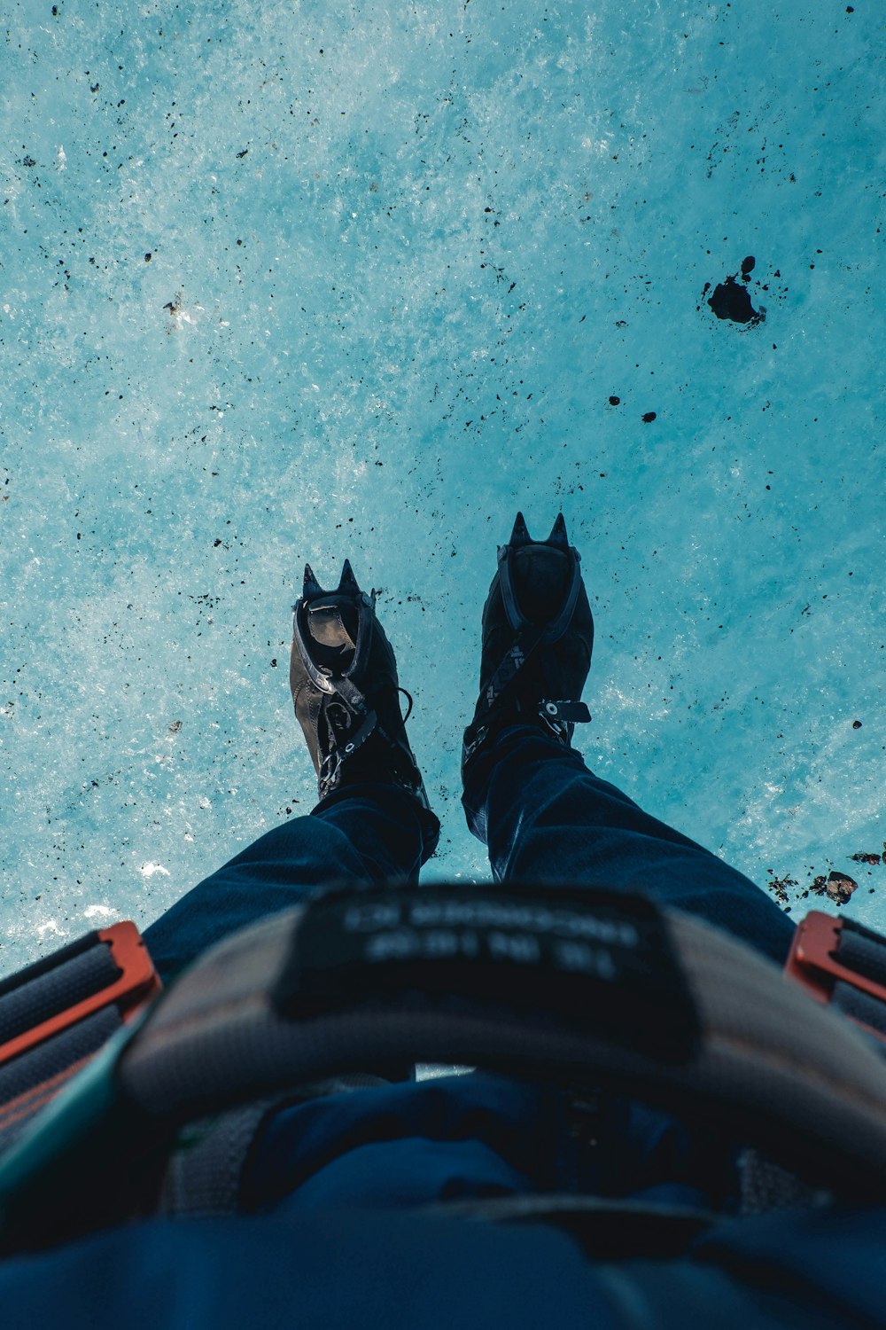 a person standing on top of a snow covered ground