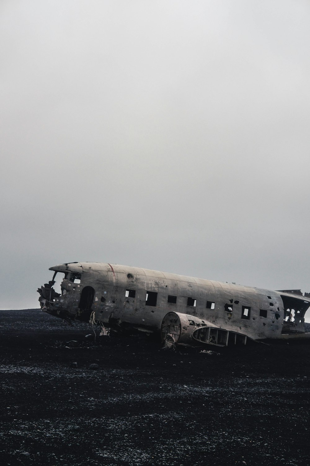 a plane that is sitting in the dirt