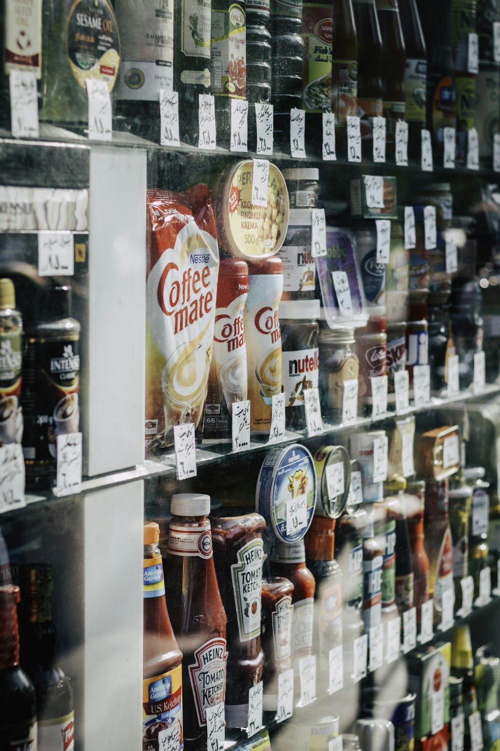 a display case filled with lots of bottles of beer