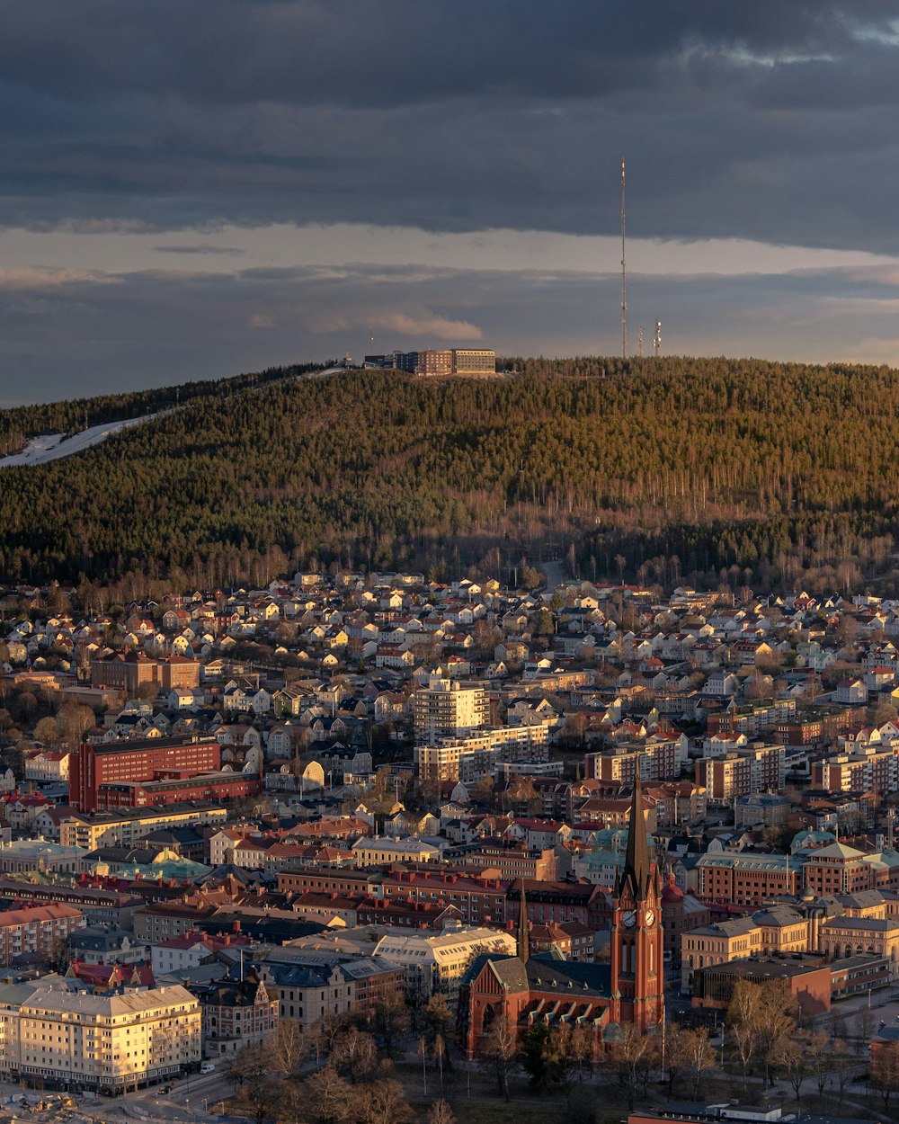 a view of a city from the top of a hill