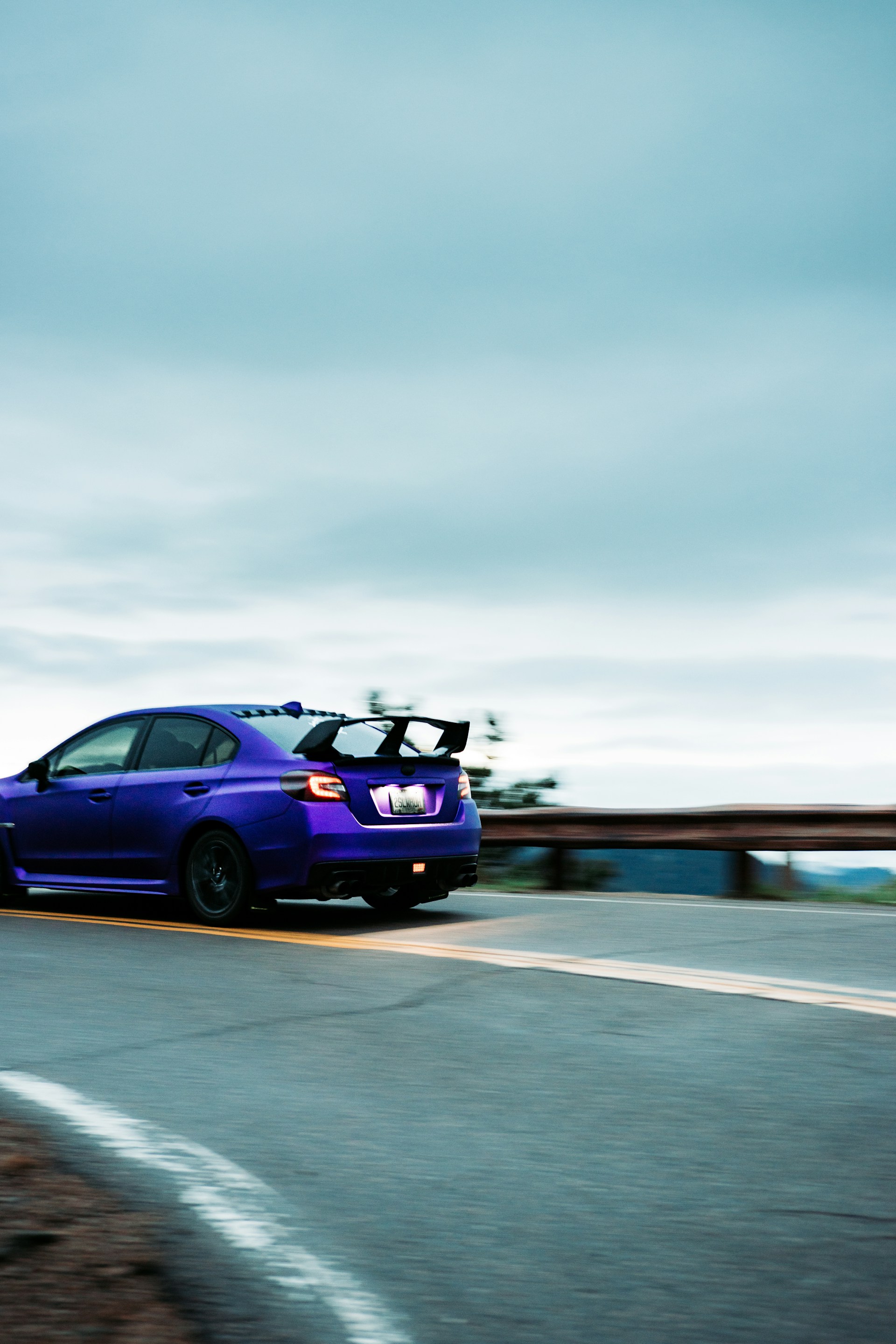 woman wearing yellow long-sleeved dress under white clouds and blue sky during daytime