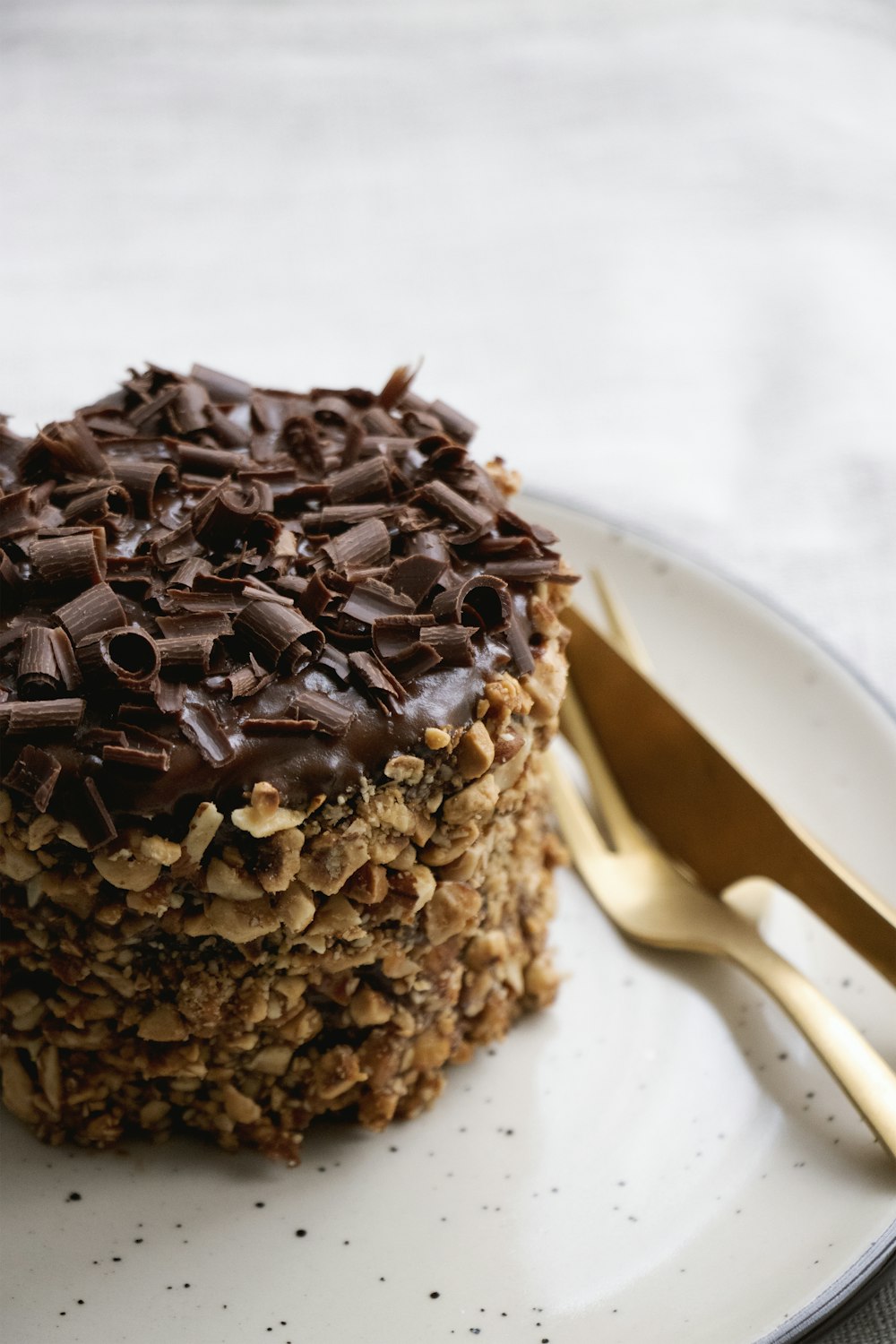 chocolate cake on white ceramic plate