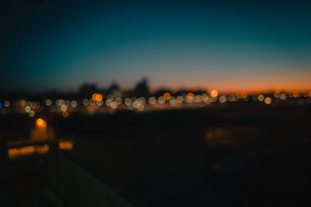 a blurry photo of a city at night