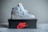 a pair of sneakers sitting on top of a box