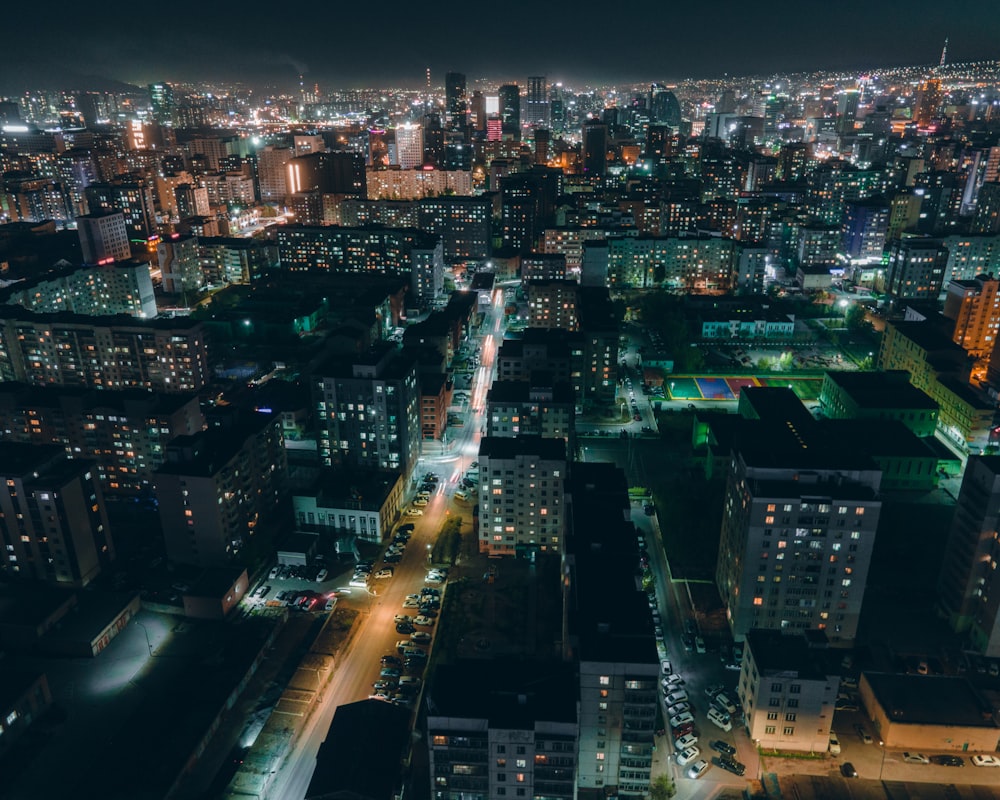 an aerial view of a city at night