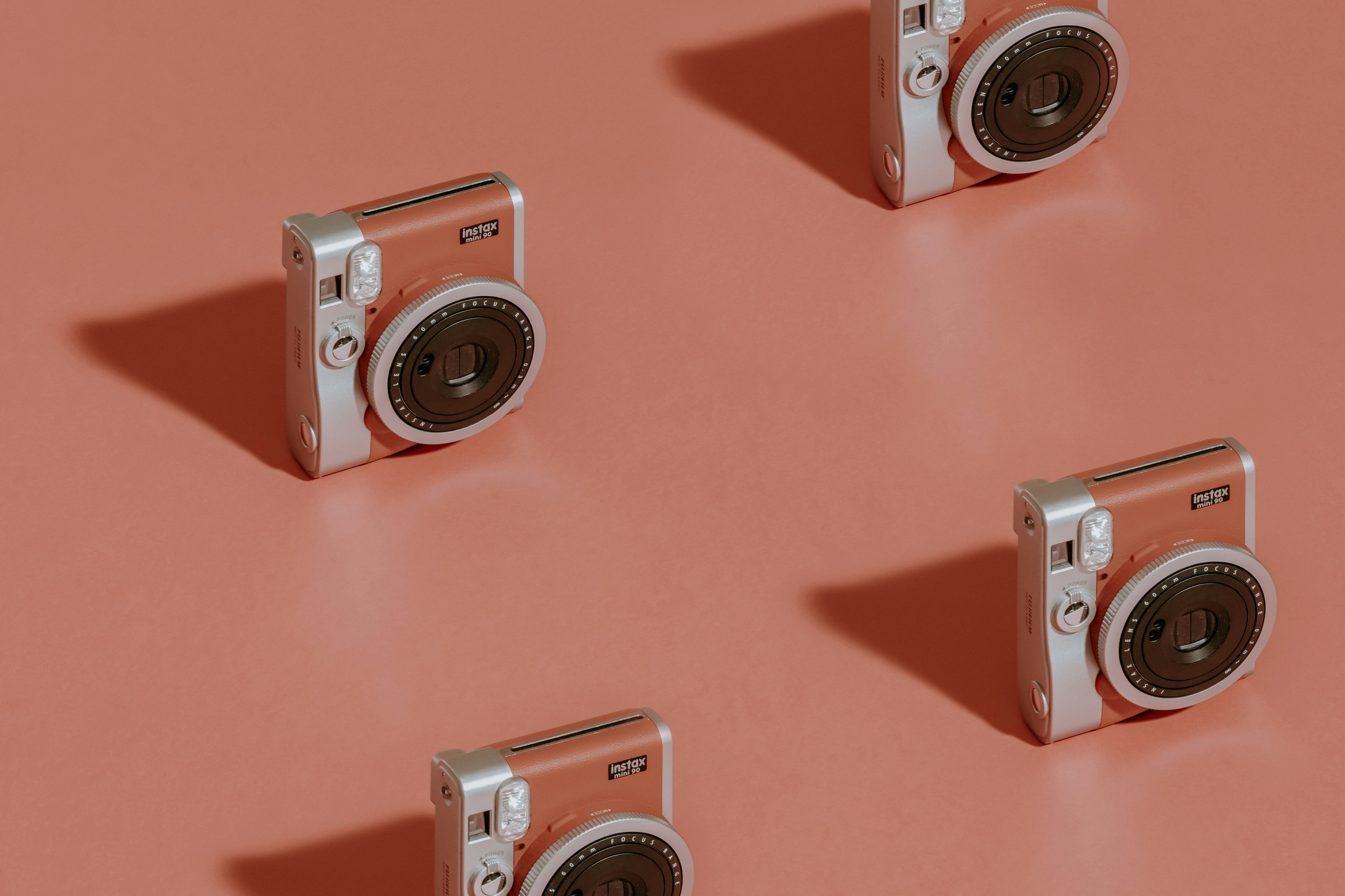 silver and black point and shoot camera