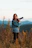 a woman taking a picture with a camera