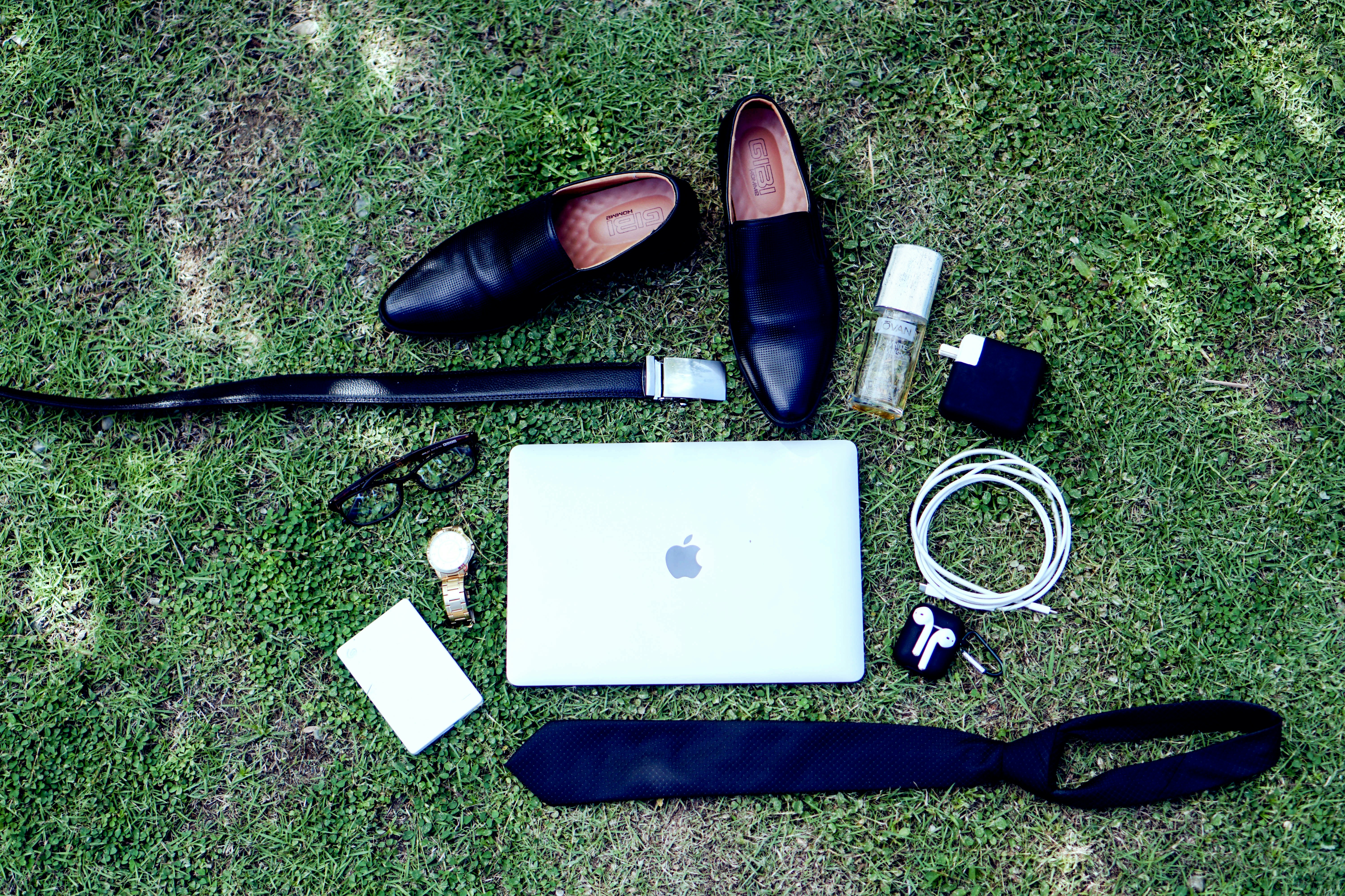 black sunglasses beside white paper and white paper