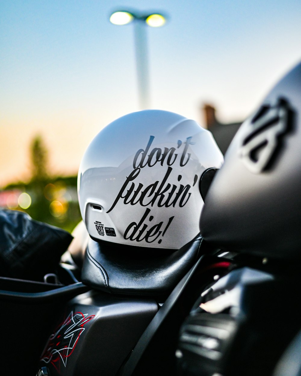 black motorcycle helmet on motorcycle
