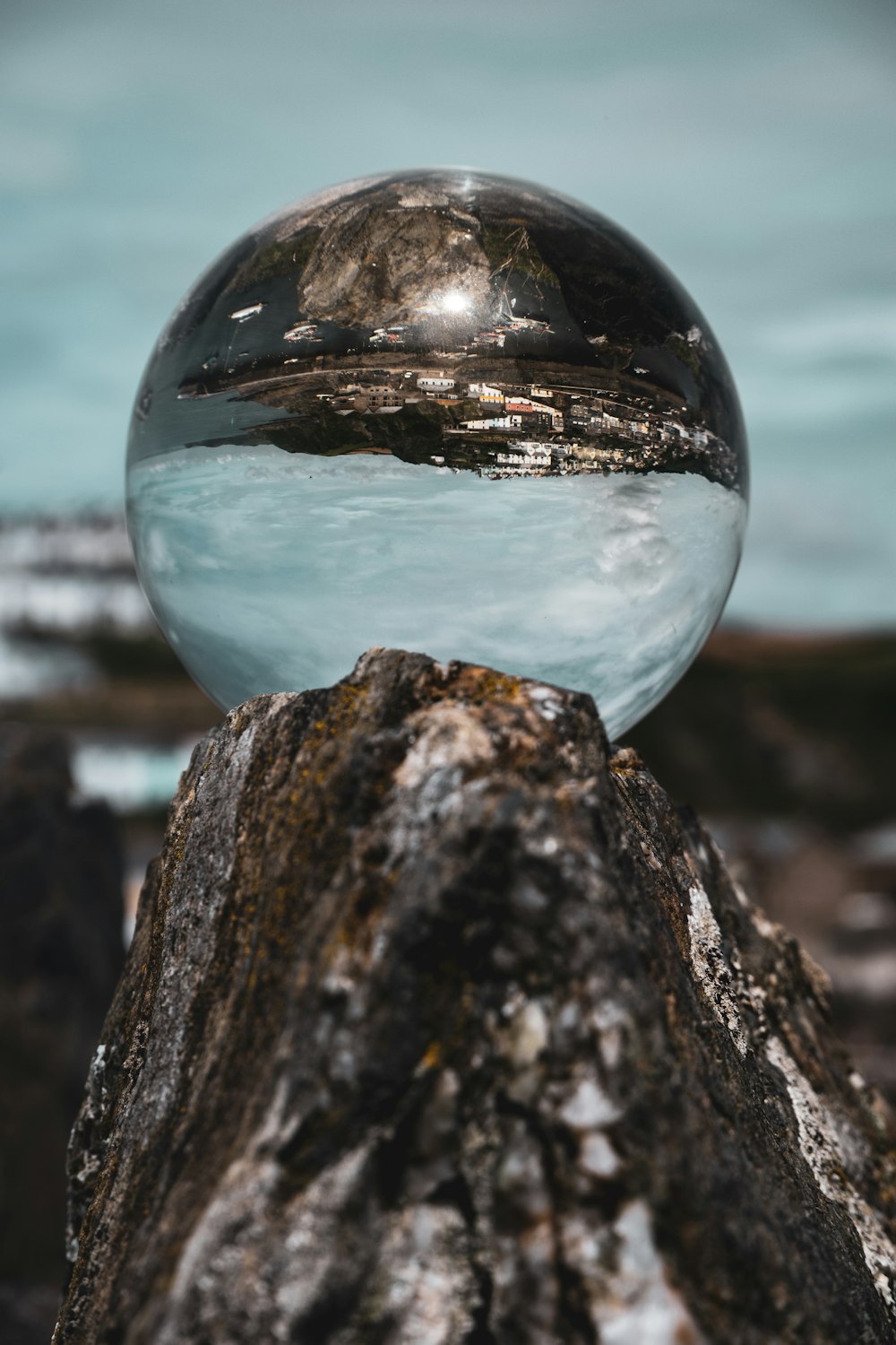 water ball on brown rock