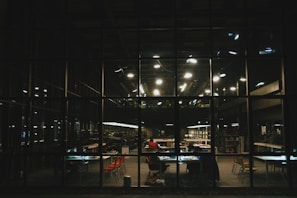 people walking on street during night time