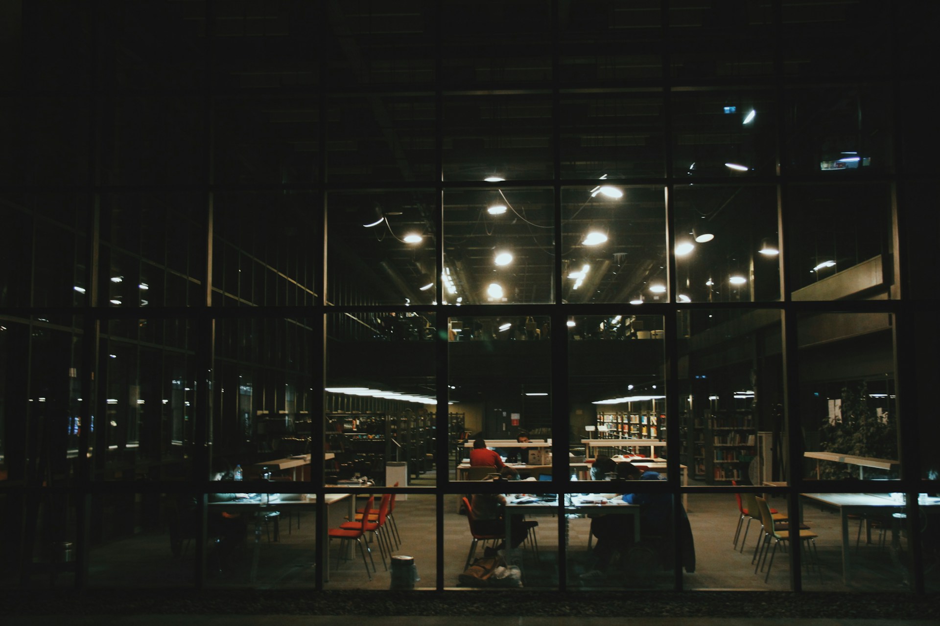 people walking on street during night time