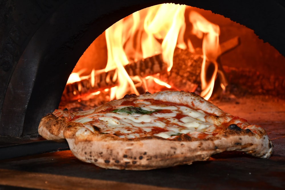 pizza on brown wooden table