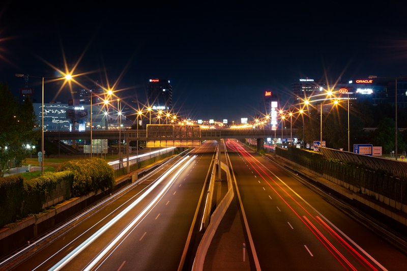 time lapse photography of cars on road during night time