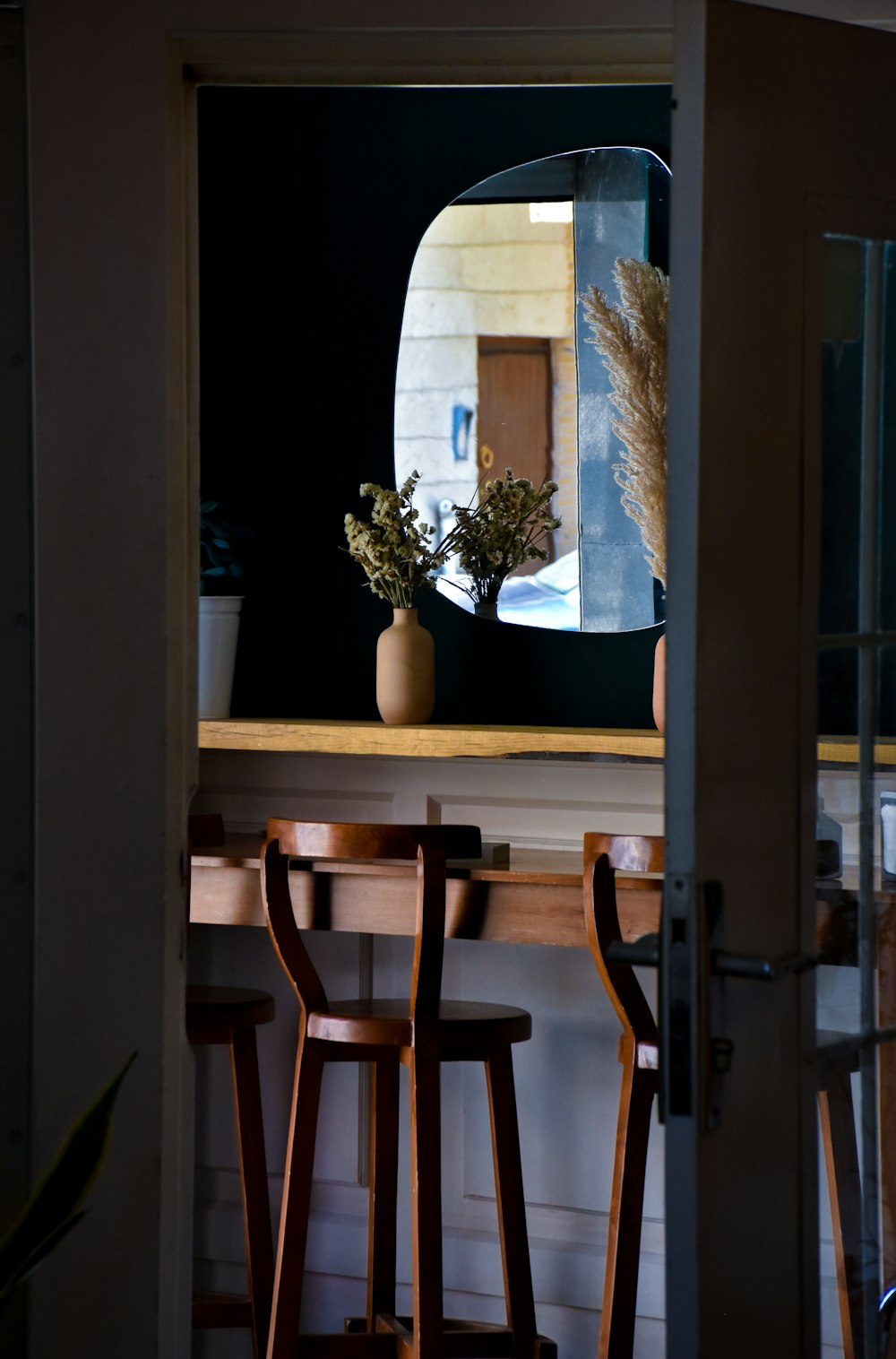 brown wooden table with chairs