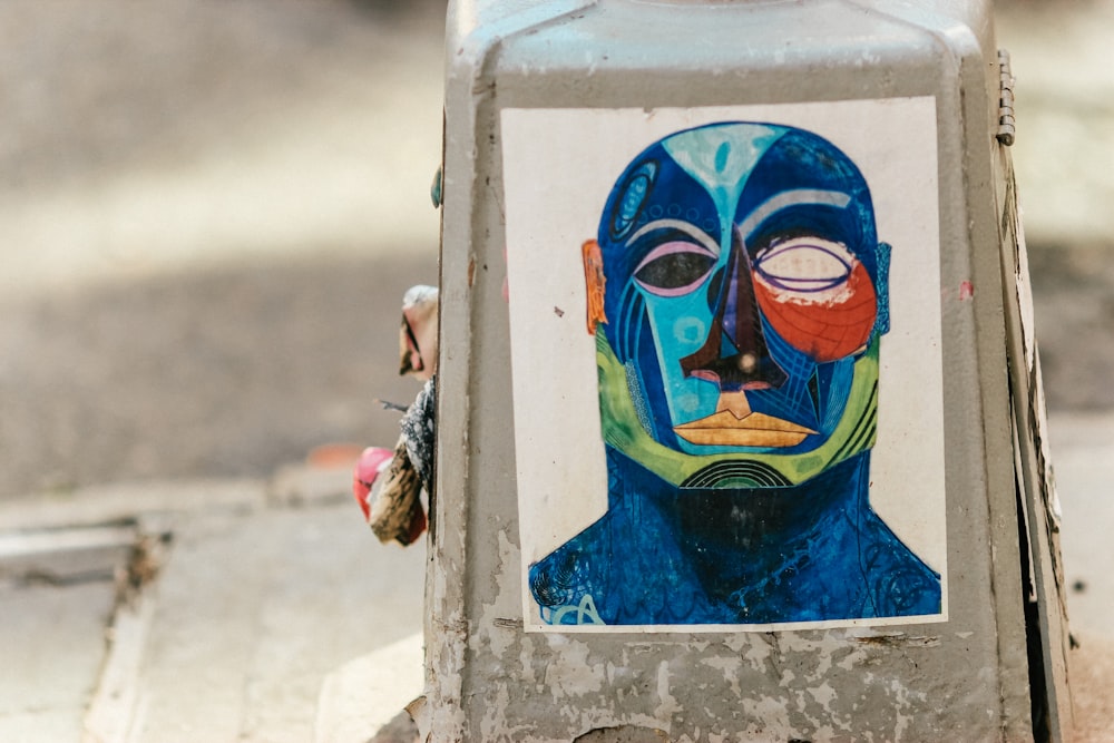 woman in blue and yellow face mask