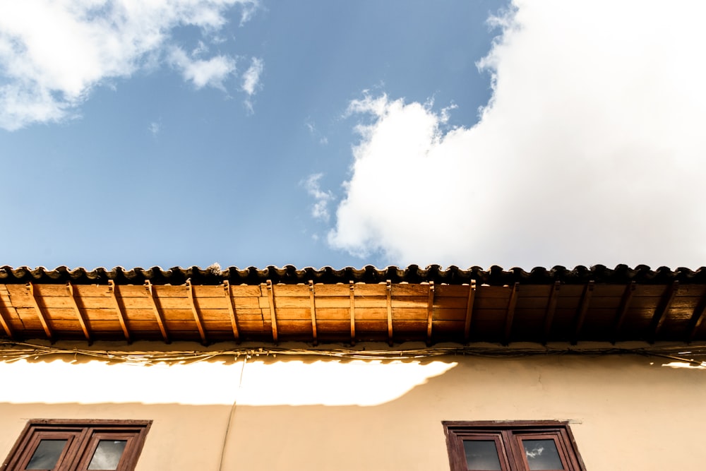 brown concrete building under blue sky during daytime