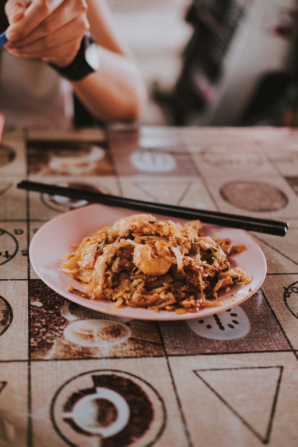 white ceramic plate with food on table