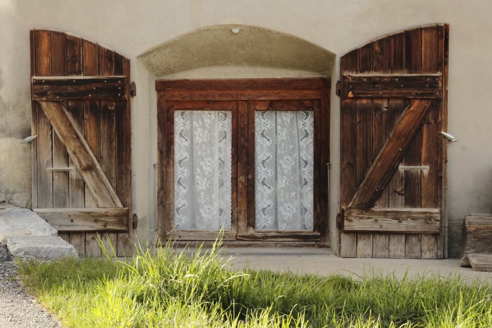 brown wooden window frame on green grass field