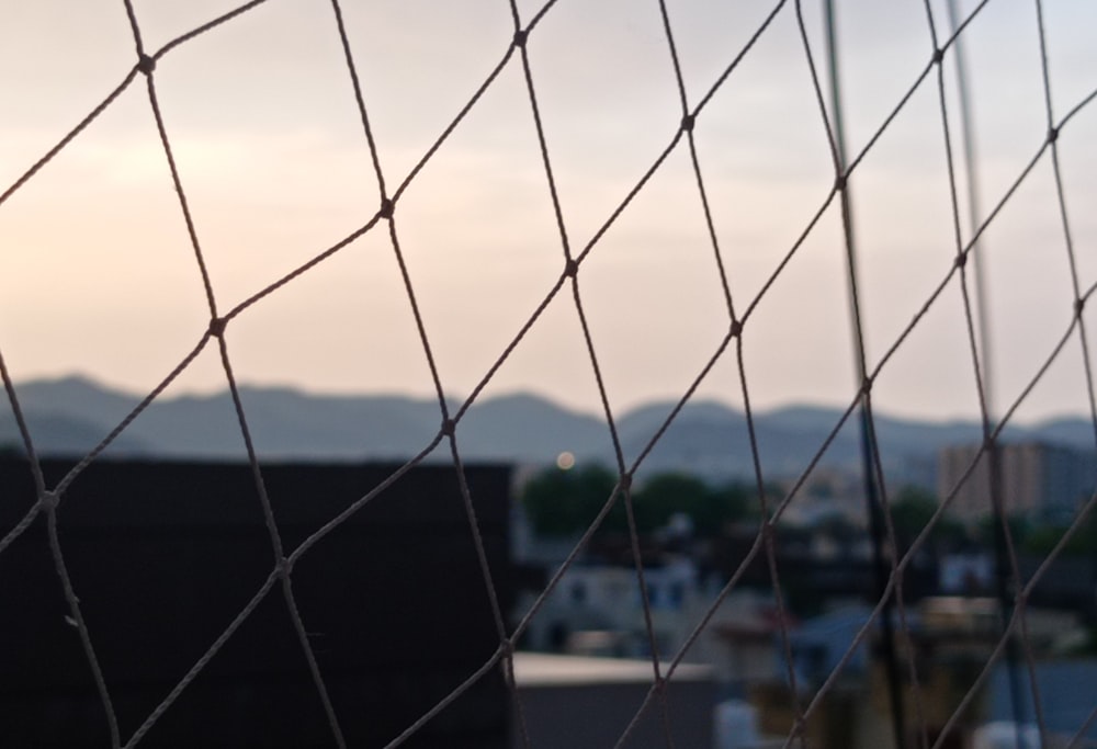 black metal fence during daytime