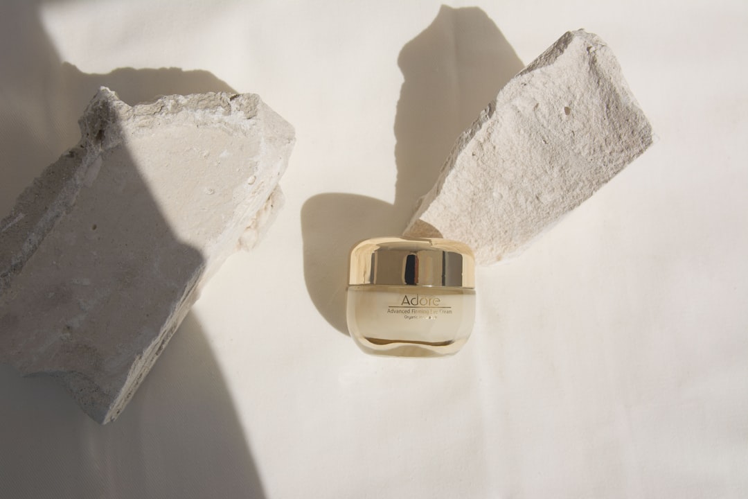 white plastic bottle on white table,