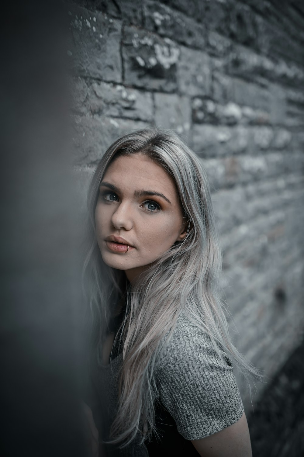 woman in gray knit shirt