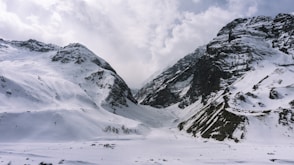snow covered mountain during daytime