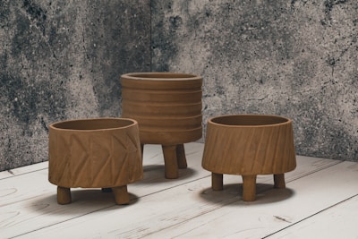 brown wooden round table on white wooden floor