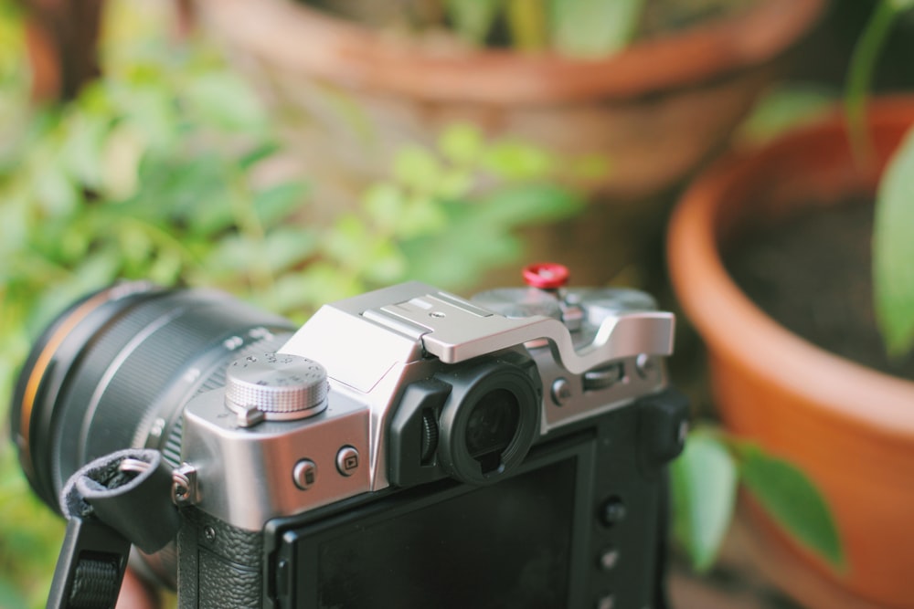 black and silver dslr camera