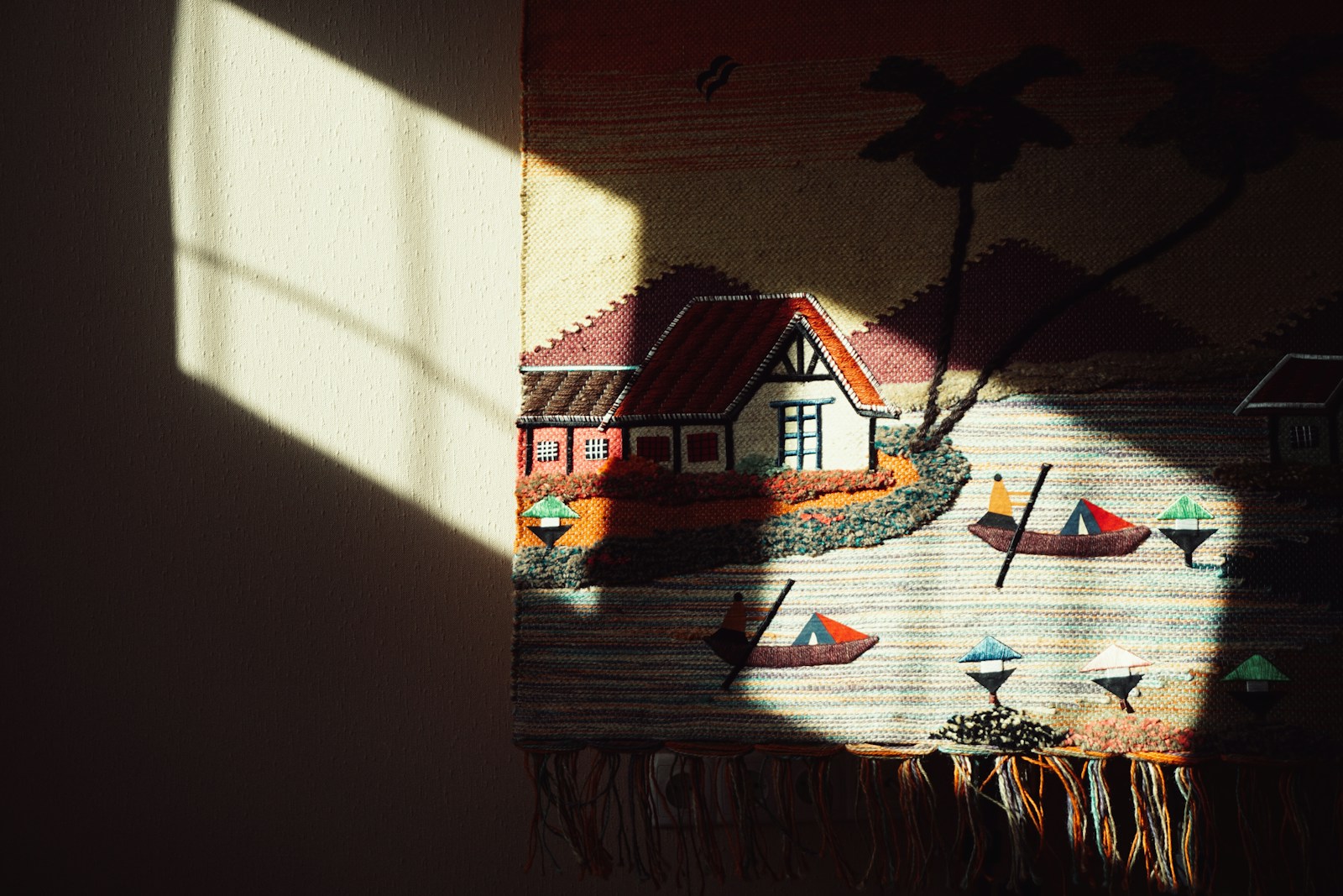 woven tapestry hanging on apartment wall as no-paint accent