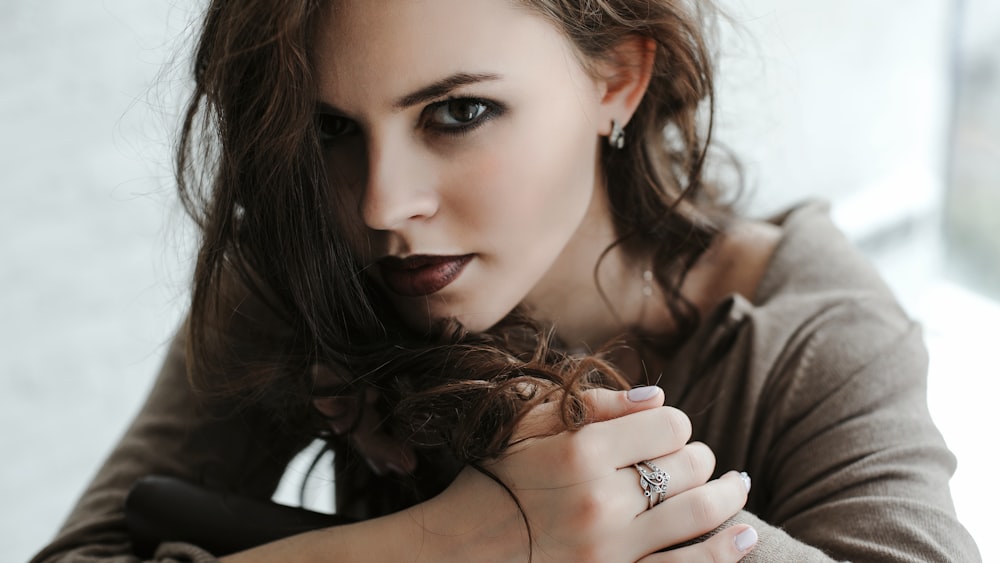 woman in black shirt with silver ring