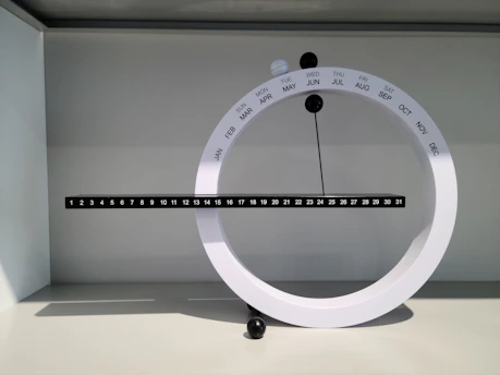 A calendar and clock representing flexible investment periods for strategic planning.