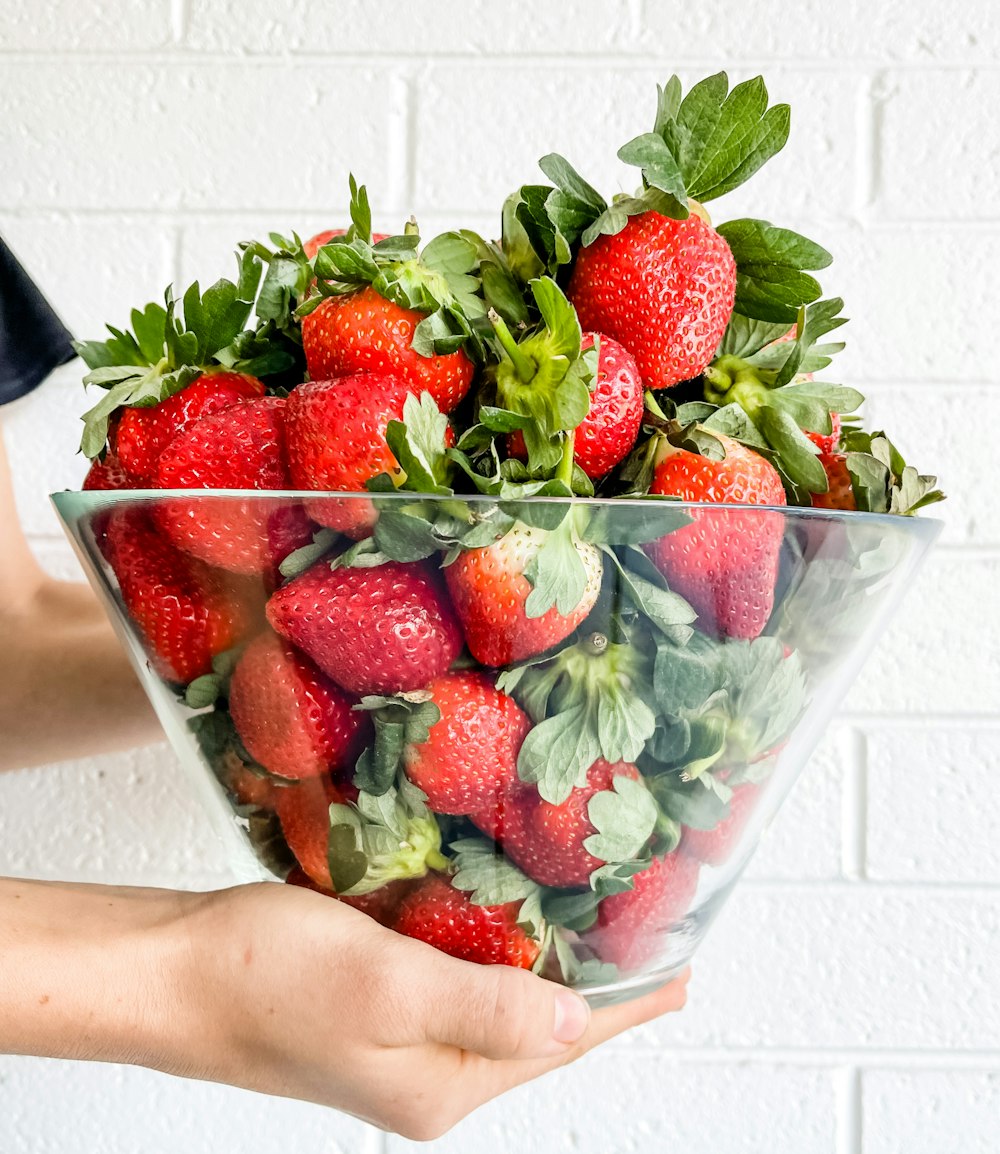 strawberries in clear plastic container