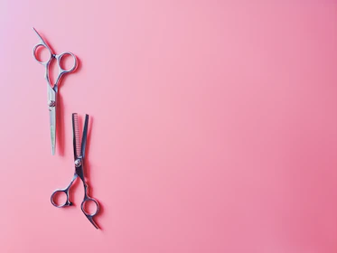 silver scissors and silver scissors