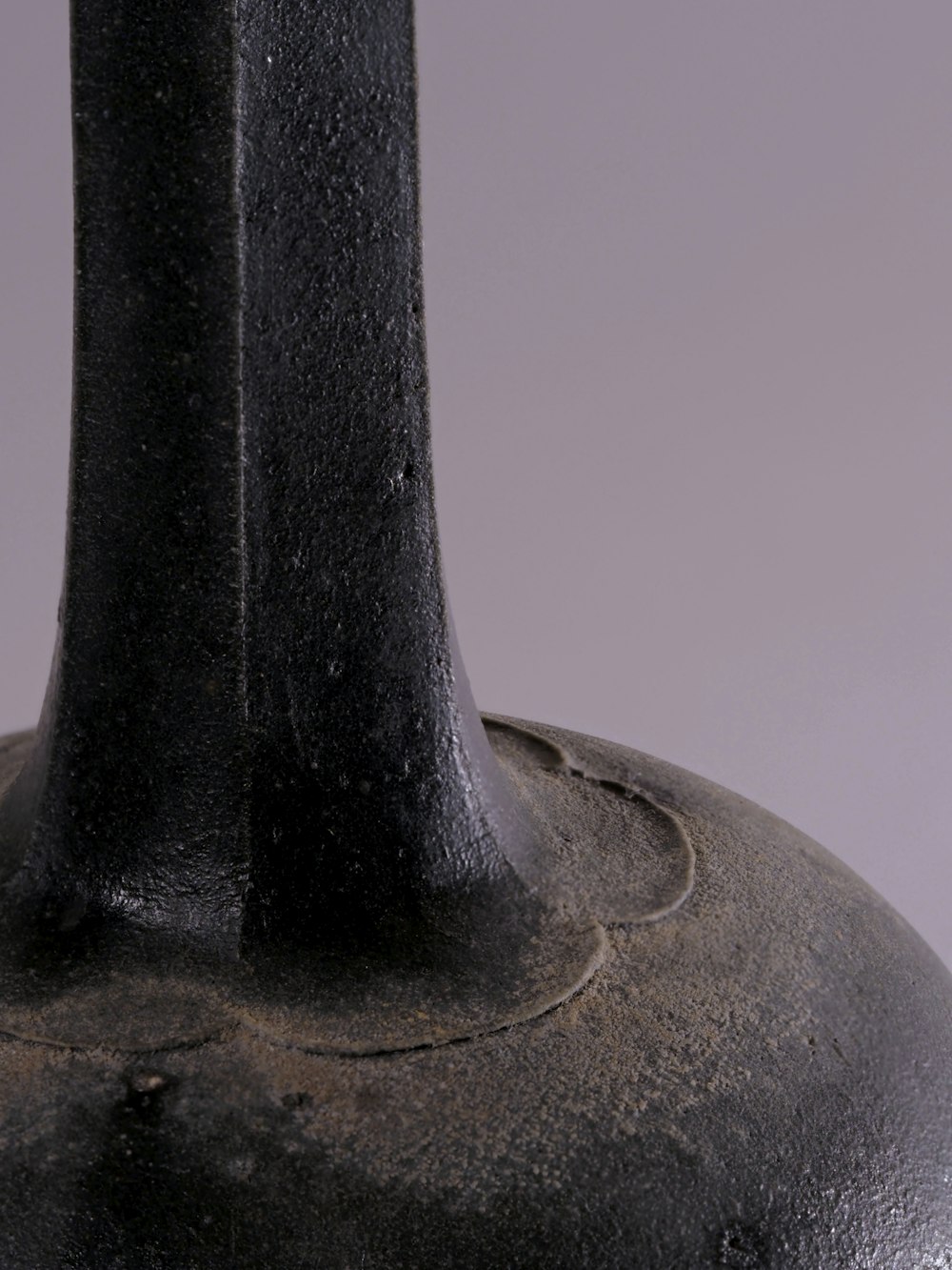black and brown ceramic vase