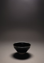 An elegant handmade ceramic bowl with a glossy finish.