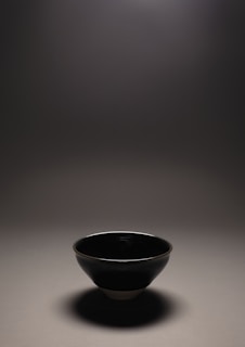 Handcrafted marble bowl with smooth curves and a glossy finish
