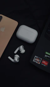 A close-up of stylish electronics gadgets displayed on a sleek counter.