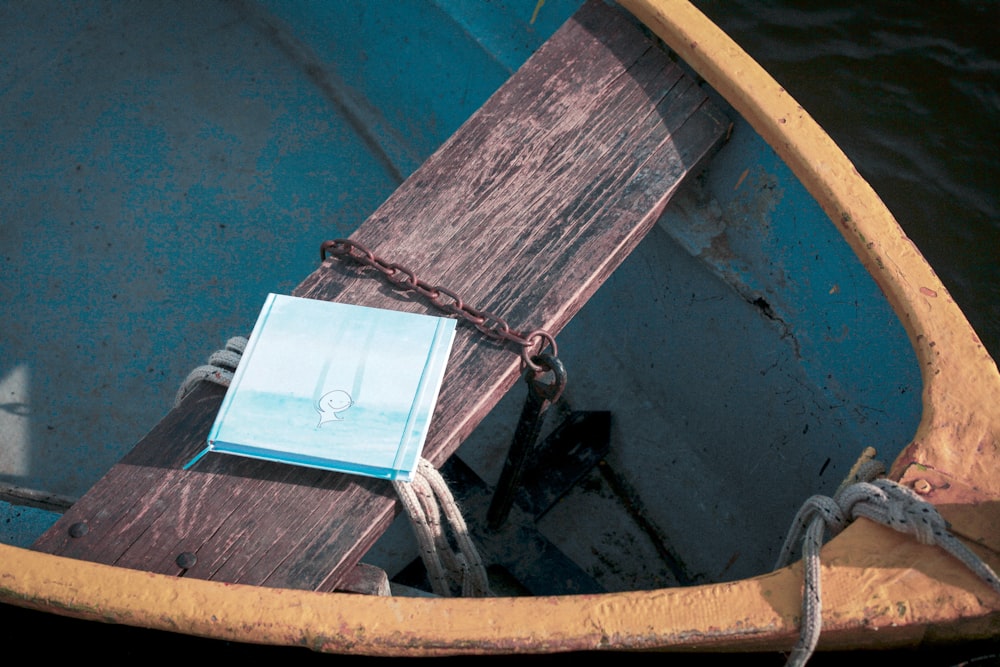 brown wooden boat on water