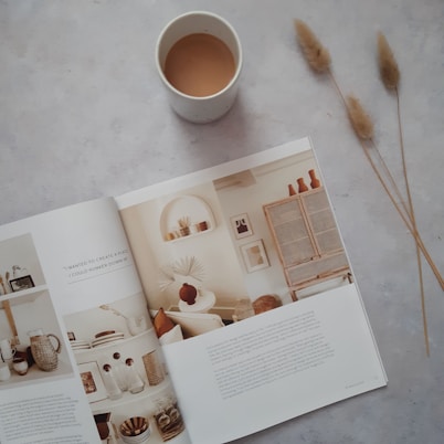 white ceramic mug on white printer paper
