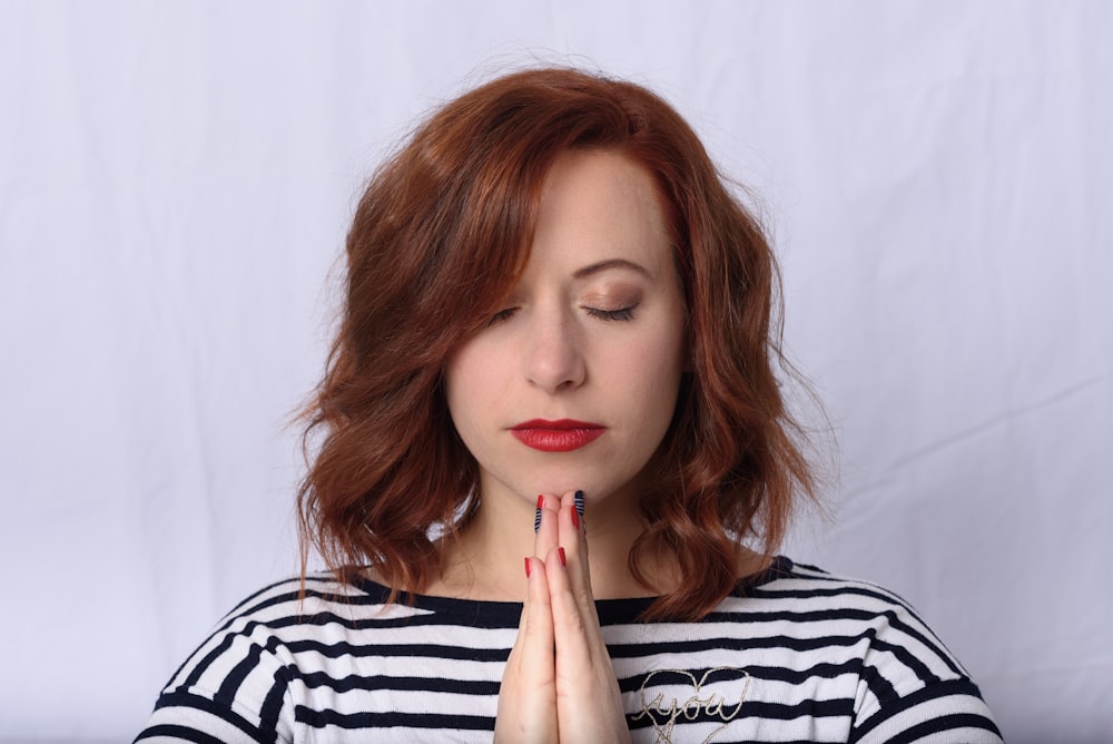 woman in black and white striped shirt