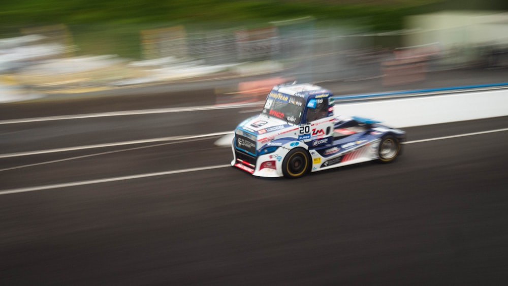 a person driving a car on a race track